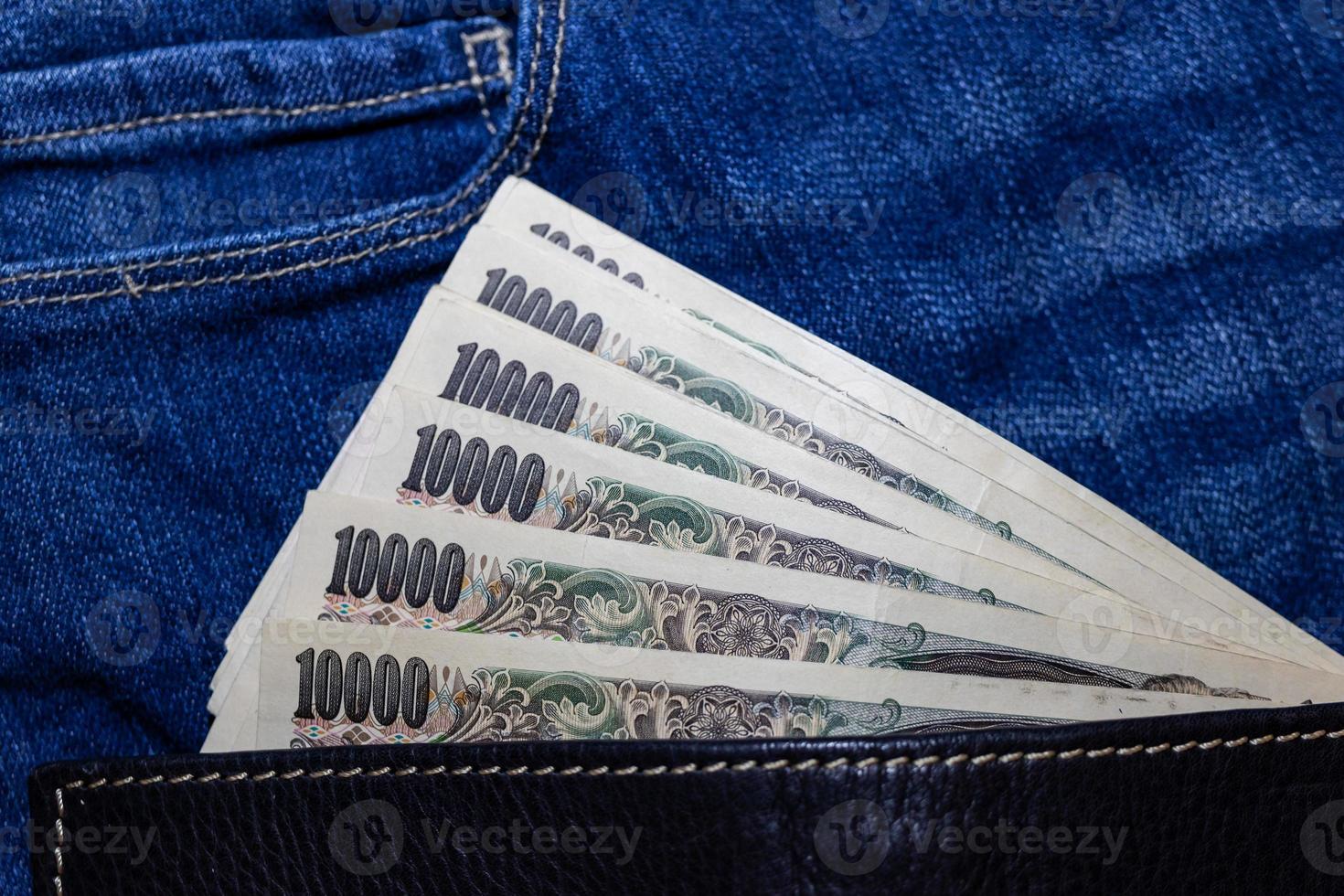 Japanese money, Japan Banknote, yen on Jean Background. photo