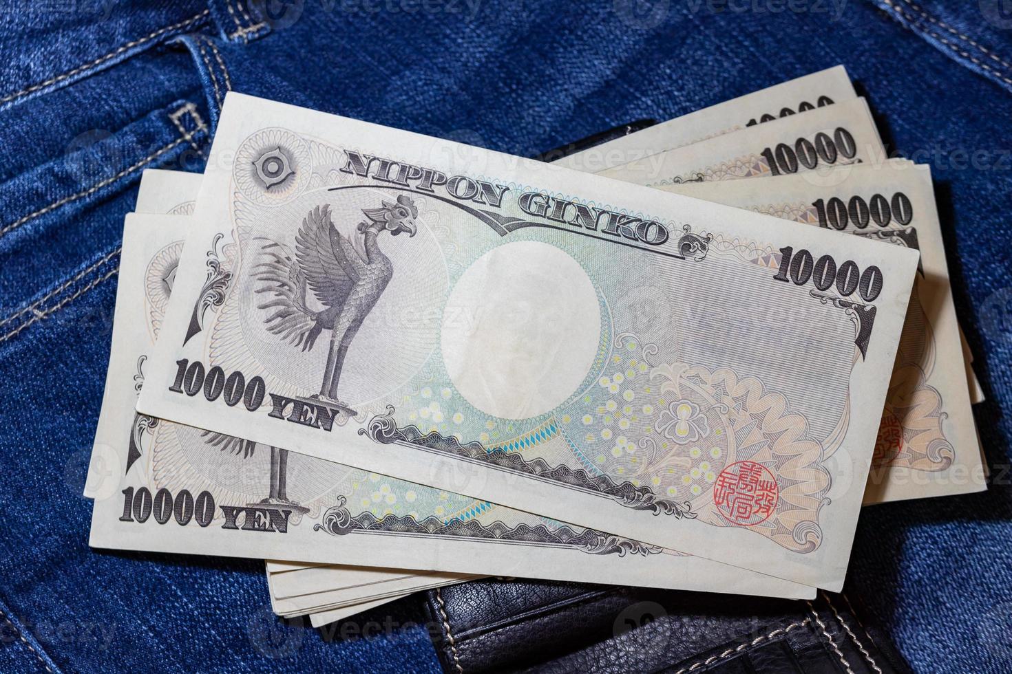 Japanese money, Japan Banknote, yen on Jean Background. photo
