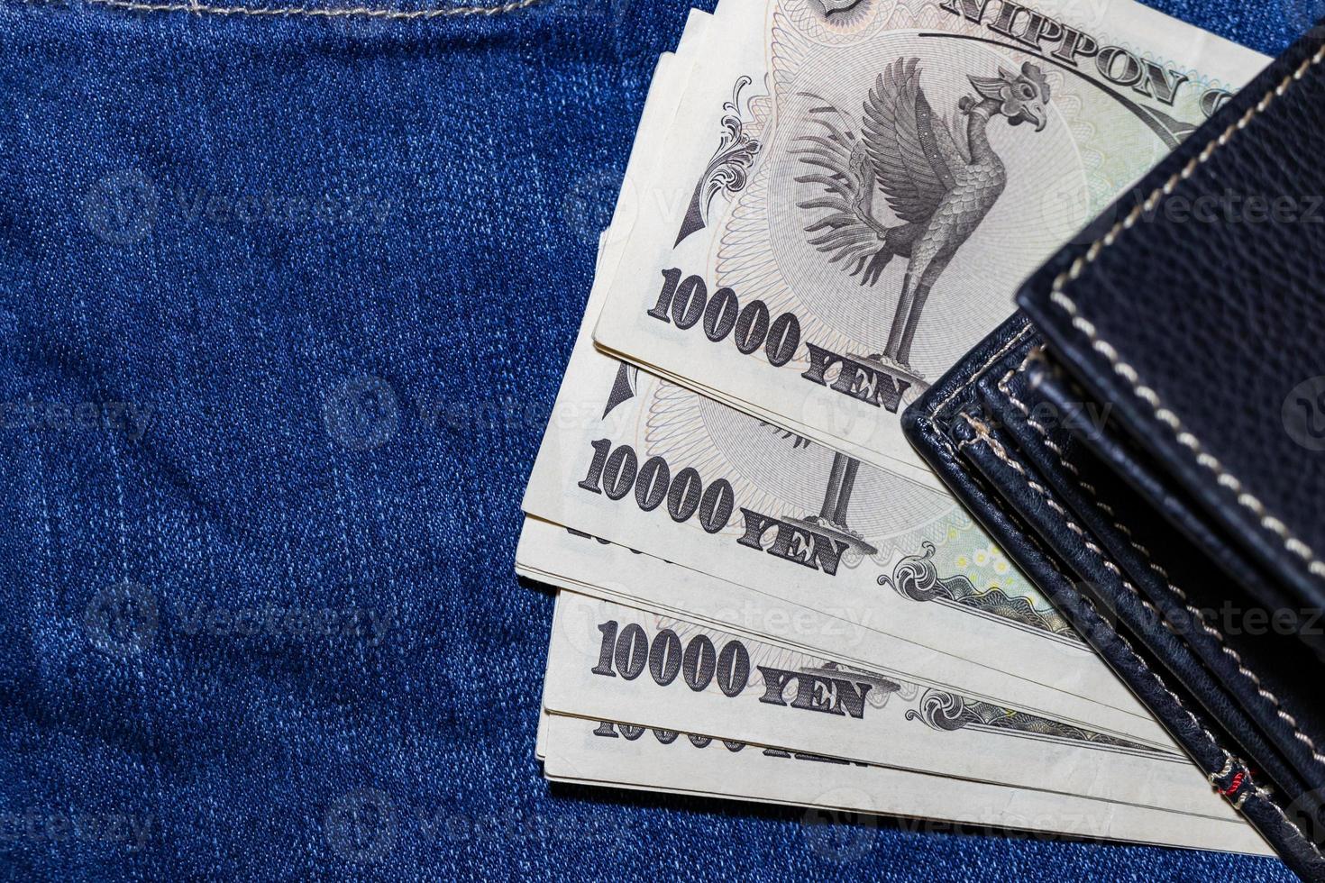 Japanese money, Japan Banknote, yen on Jean Background. photo