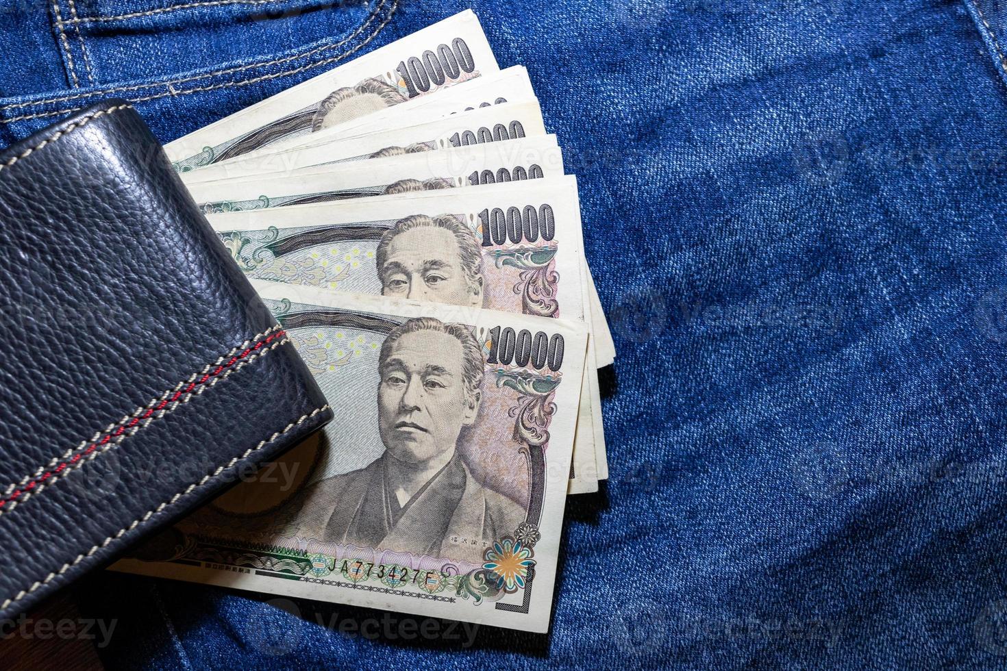 Japanese money, Japan Banknote, yen on Jean Background. photo