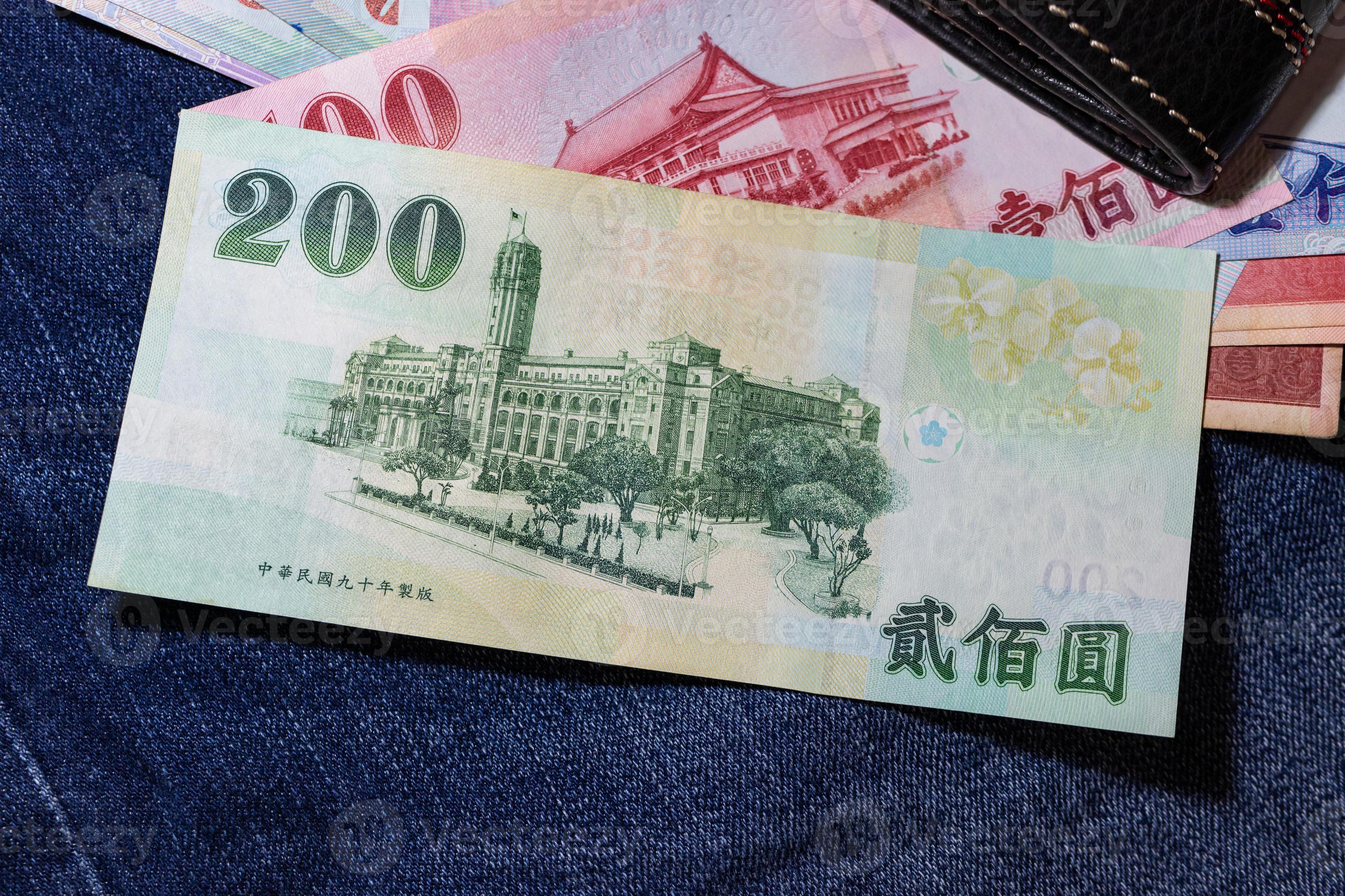 Taiwanese Money Taiwan Banknote Taiwan Dollar On Jean Background 