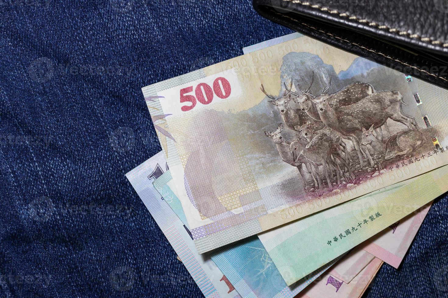 taiwanese-money-taiwan-banknote-taiwan-dollar-on-jean-background