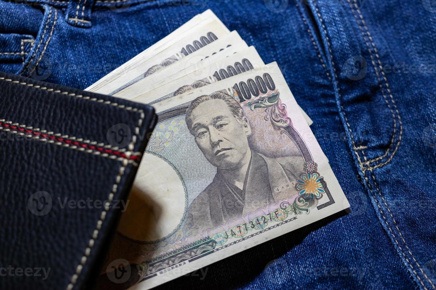 Japanese money, Japan Banknote, yen on Jean Background. photo