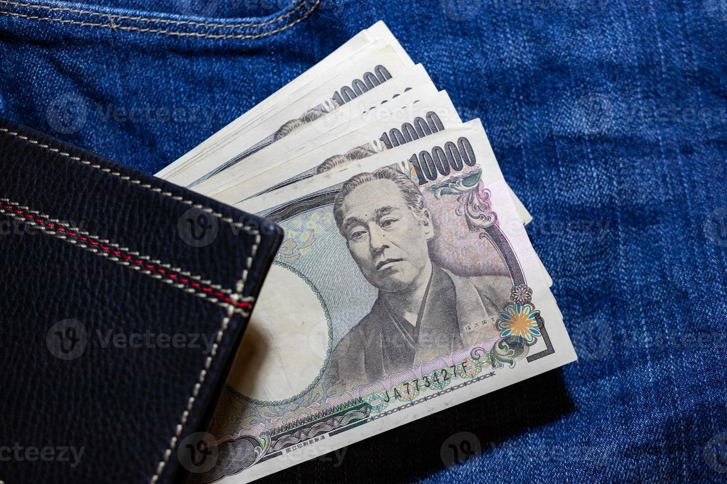 Japanese money, Japan Banknote, yen on Jean Background. photo