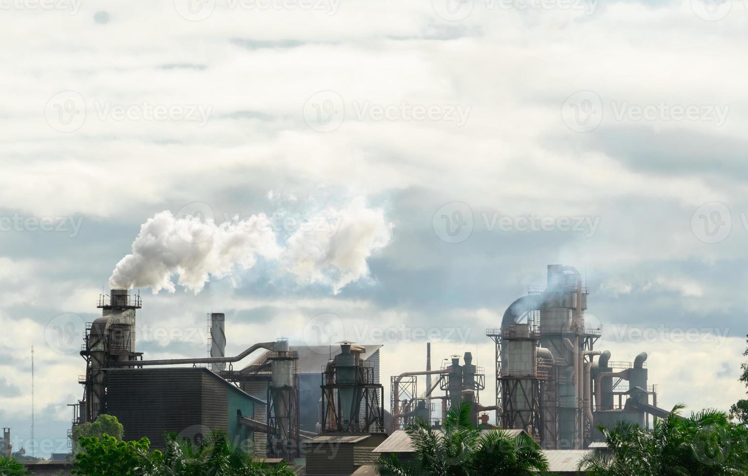 CO2 emissions. CO2 greenhouse gas emissions from factory chimneys. Carbon dioxide gas global air climate pollution. Carbon dioxide in earths atmosphere. Greenhouse gas. Smoke emissions from chimneys. photo