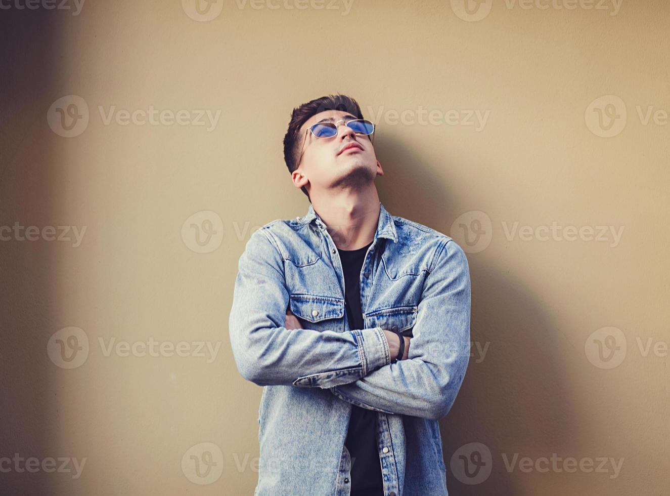 man in denim jacket photo