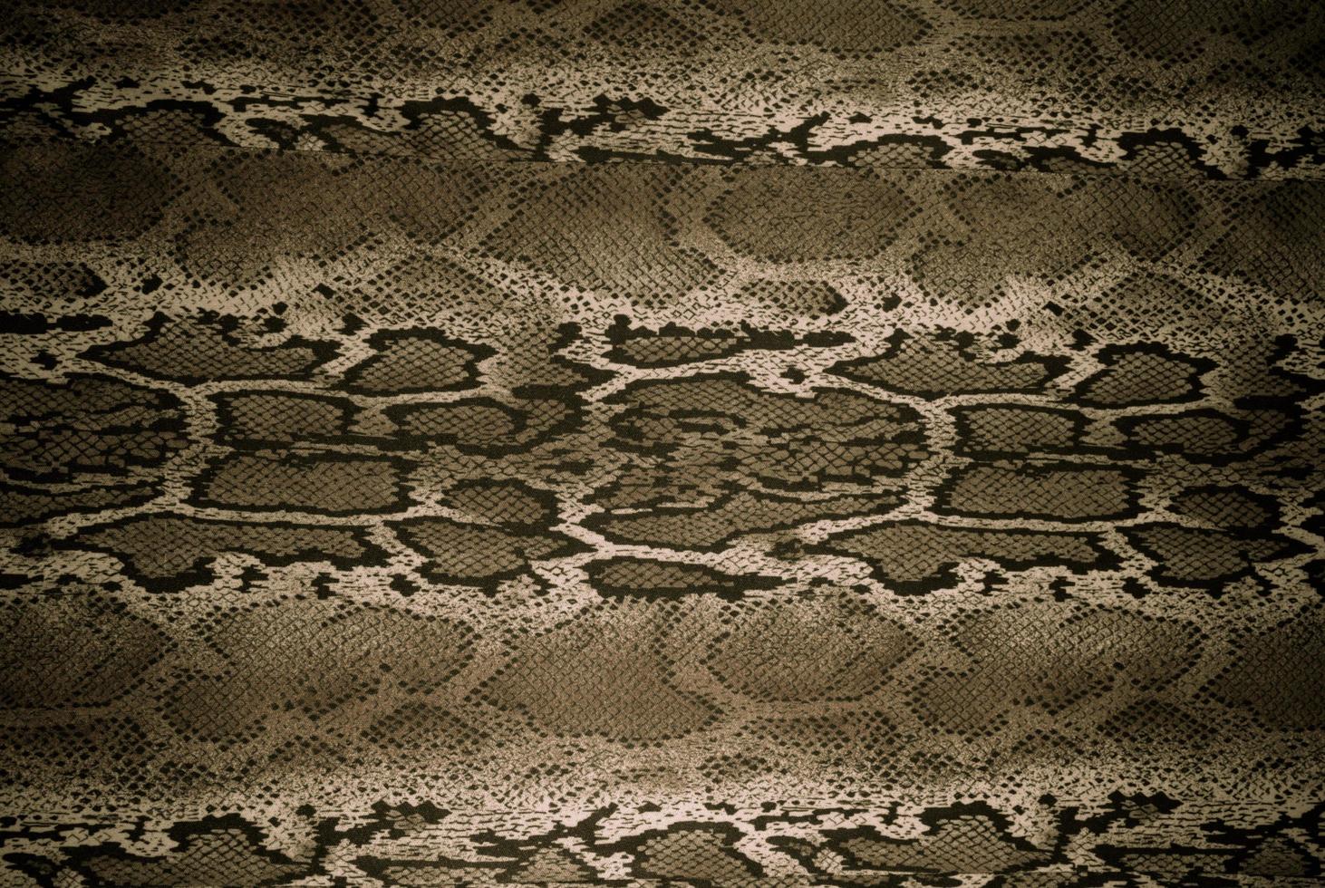 la textura de la serpiente de rayas de tela impresa para el fondo foto