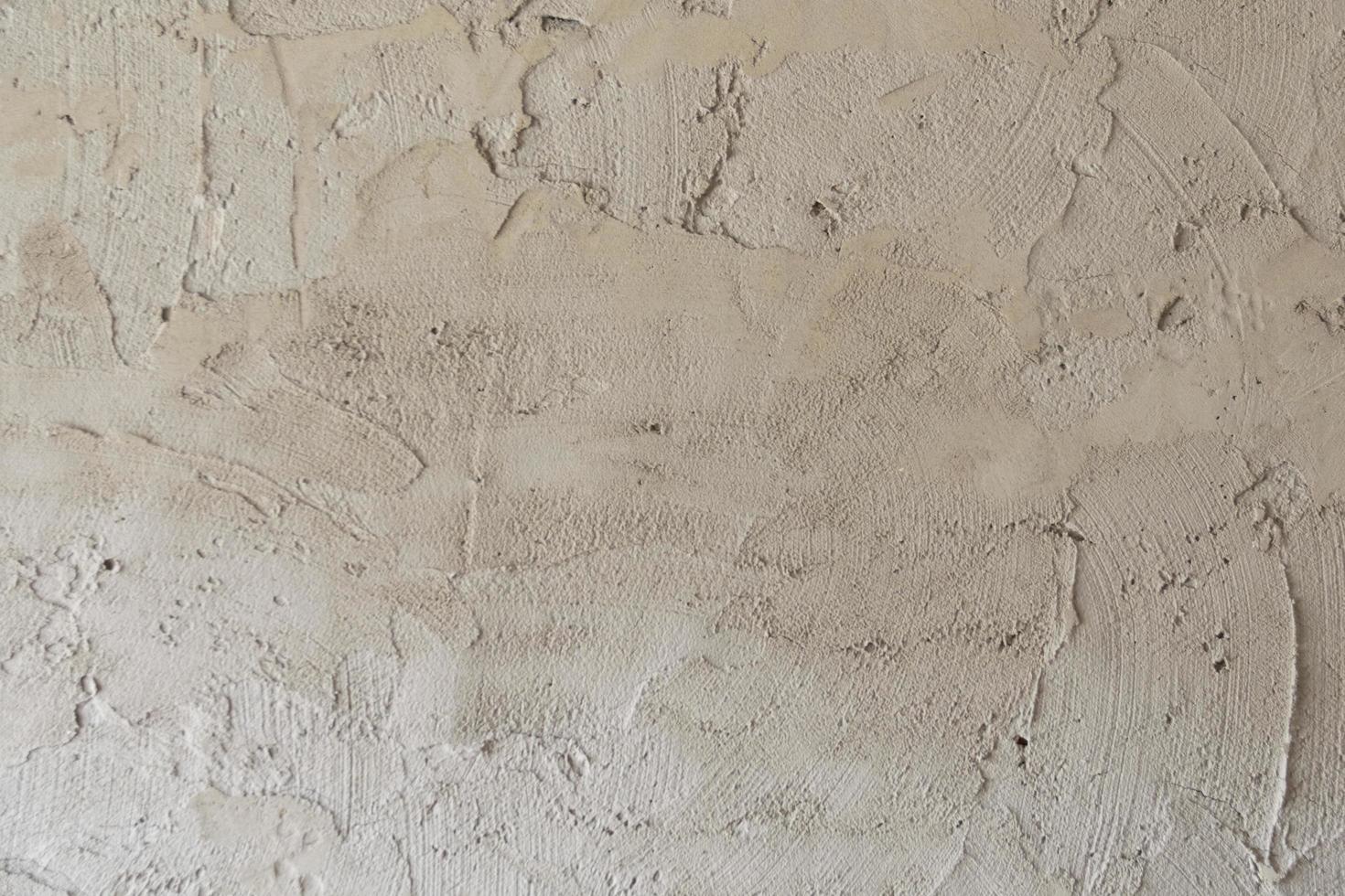 Closeup fragment of stucco wall of a building photo