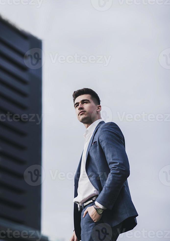 Elegant young handsome business man photo