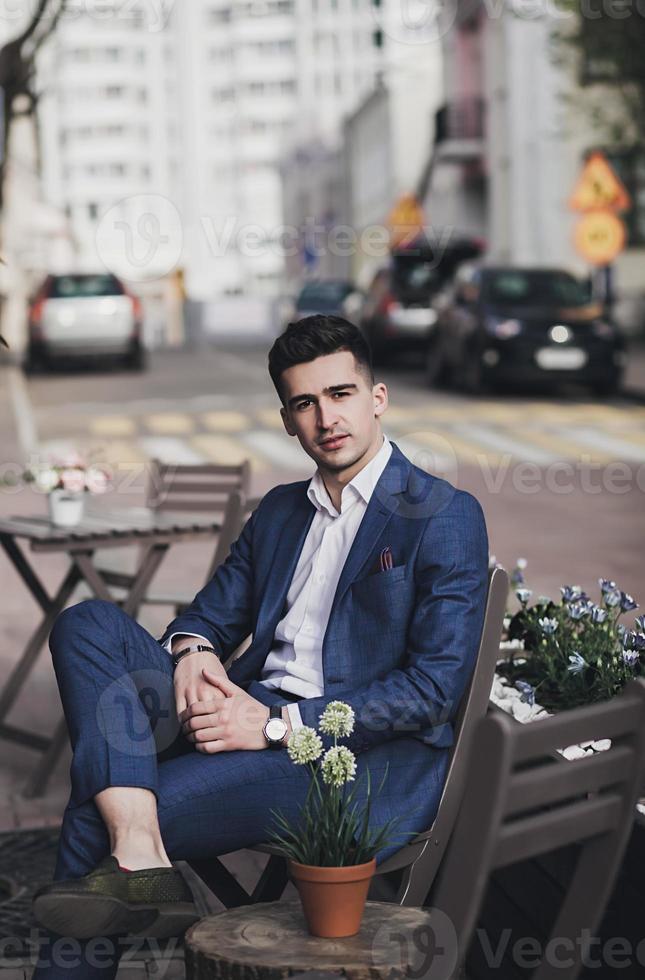Young stylish confident handsome businessman photo
