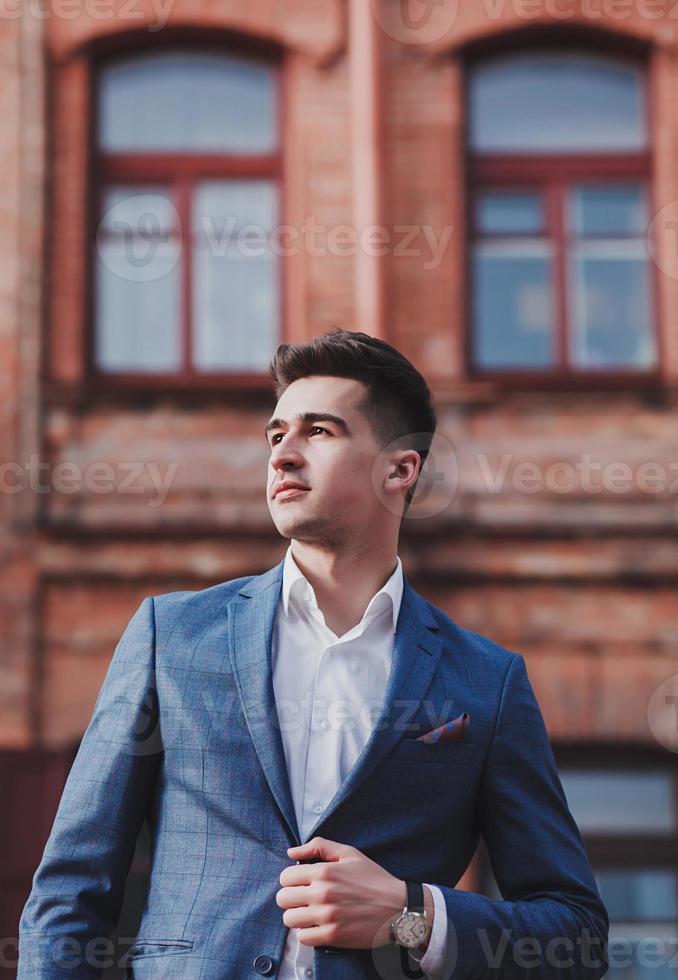 Fashion young man in suit photo