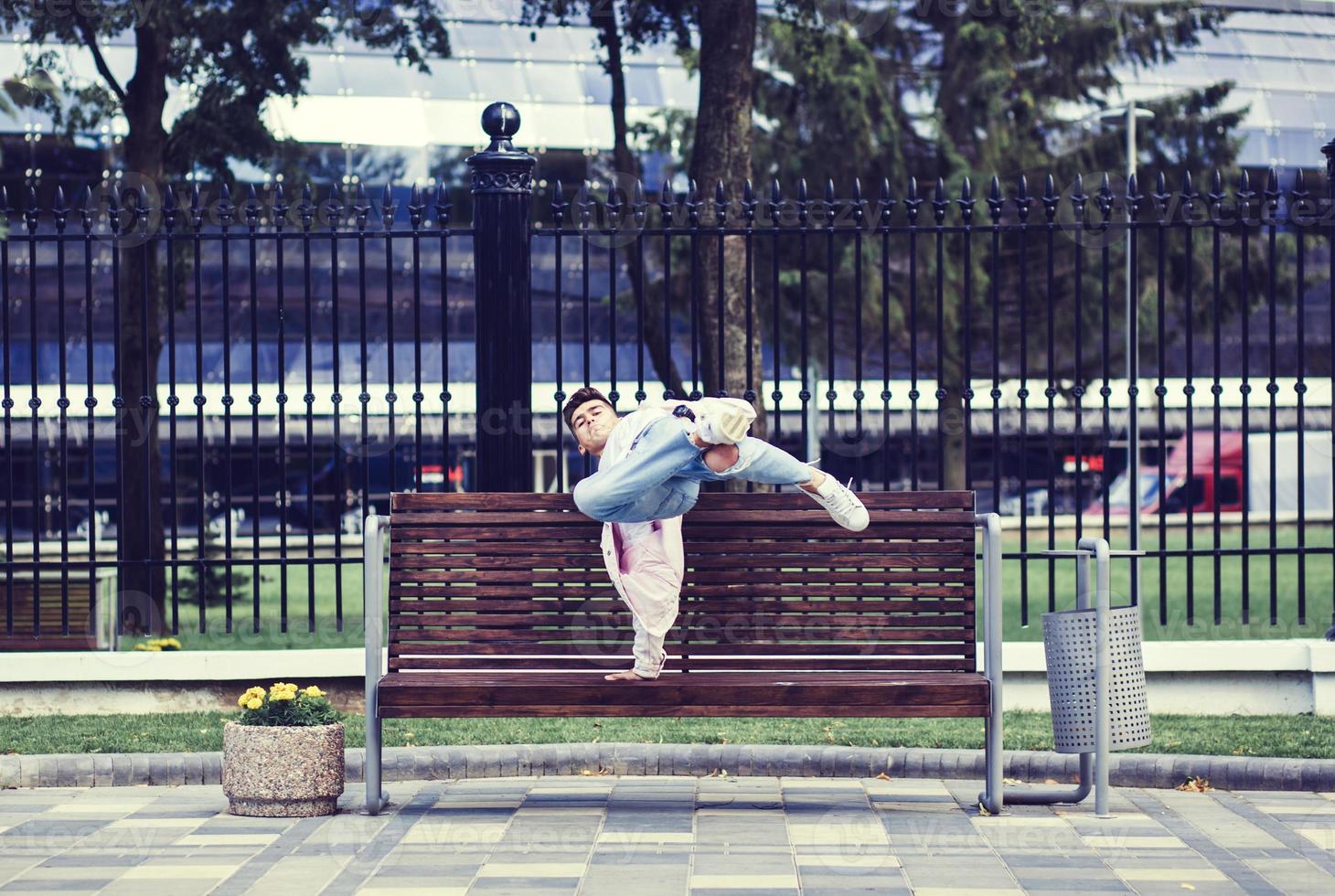 Young man break dancing photo