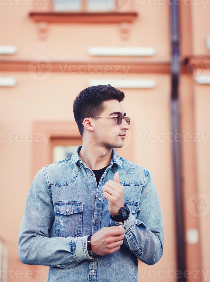 Fashion man in sunglasses photo
