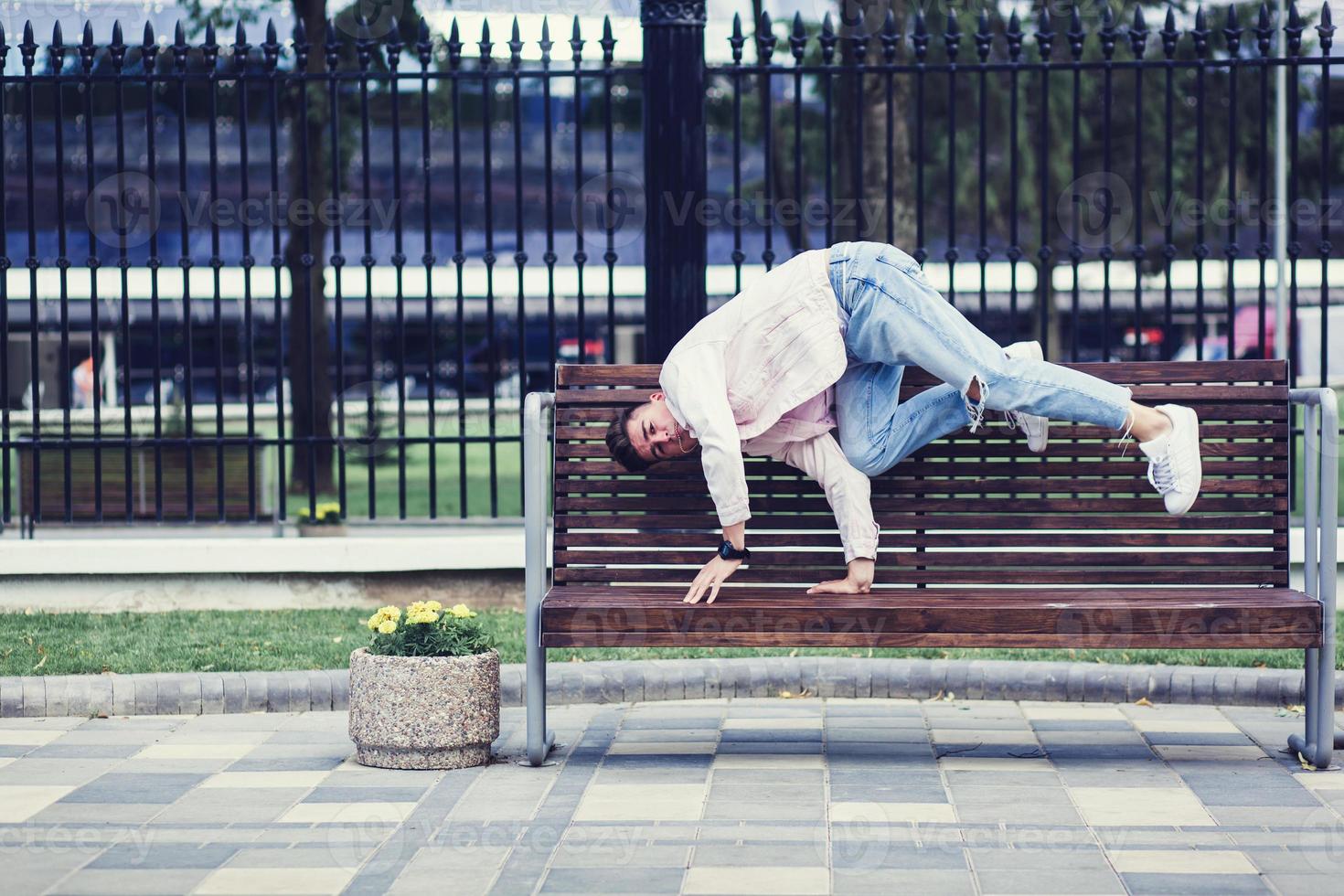 man in a jacket as break dancer photo