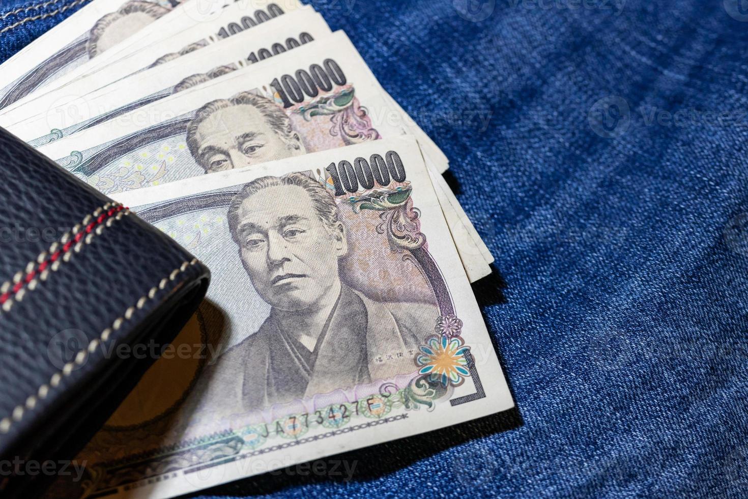 Japanese money, Japan Banknote, yen on Jean Background. photo