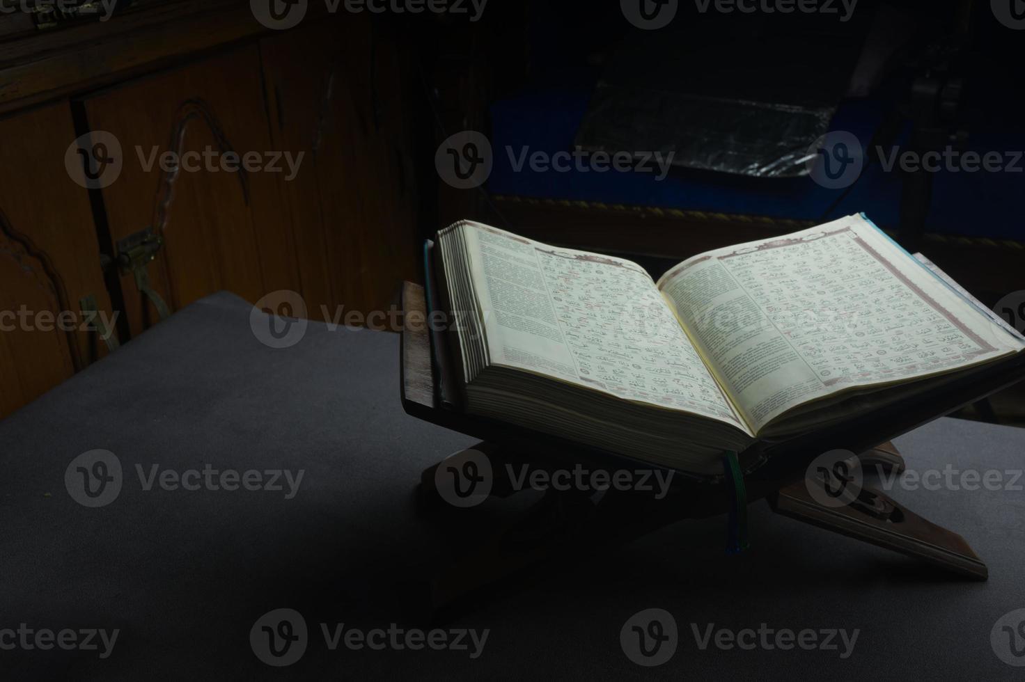 islamic book on the wood table photo