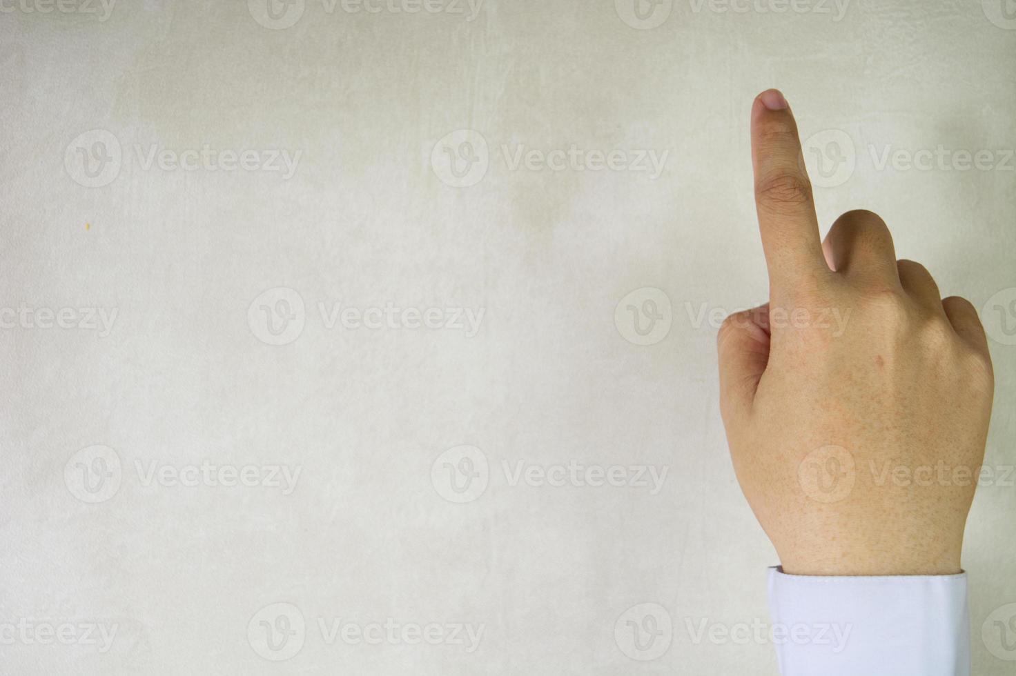 One finger of businessman photo