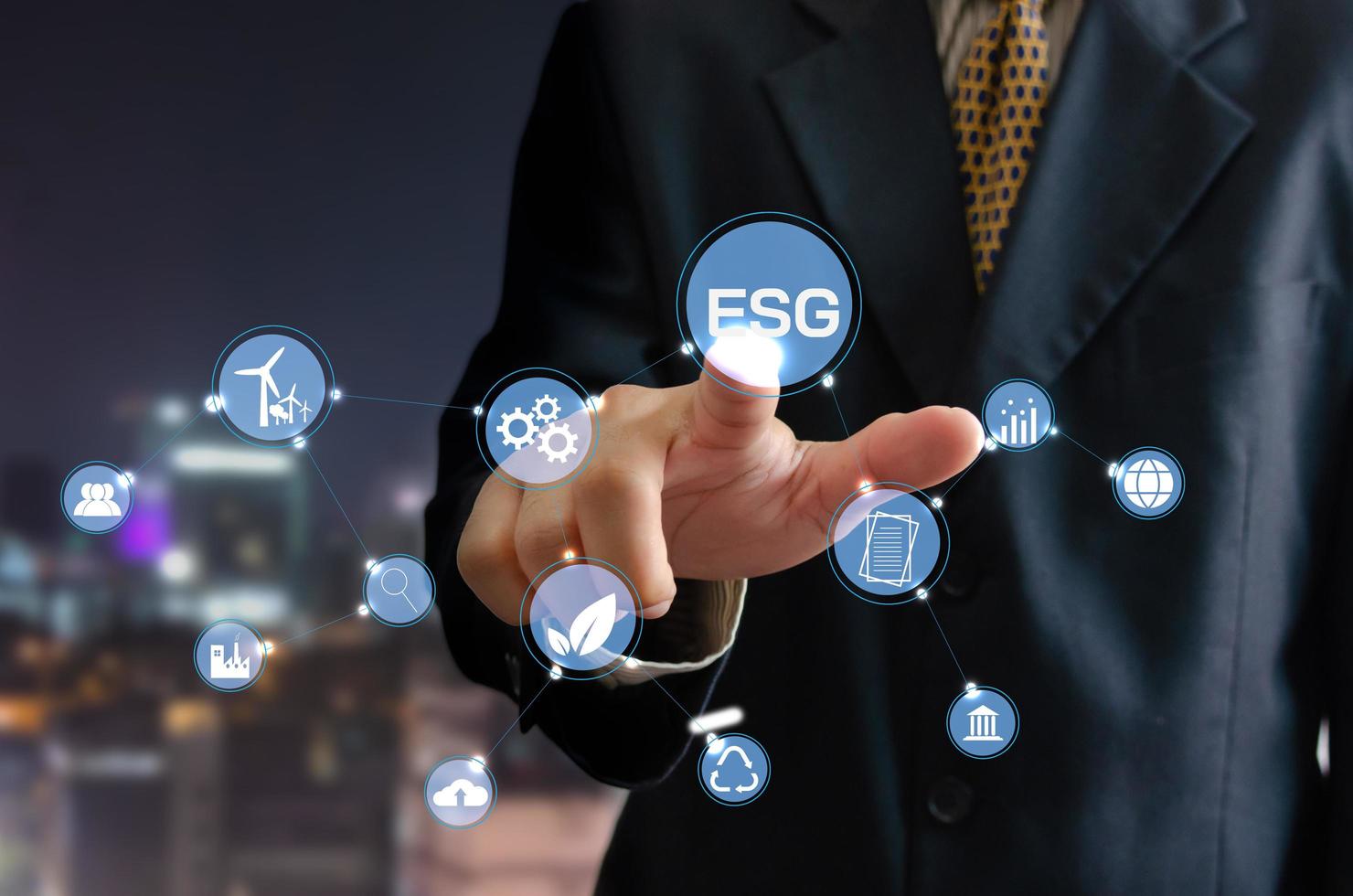 Environmental social and governance ESG investment Organizational growth that is sustainable is a business idea.  man's on icon  ESG word on hand a virtual screen. photo