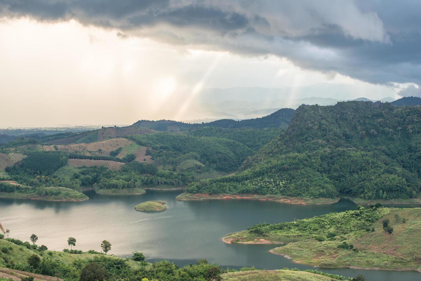 The scenery view of highland mountains with the ray light in Mae Suai district of Chiang Rai province of Thailand. photo