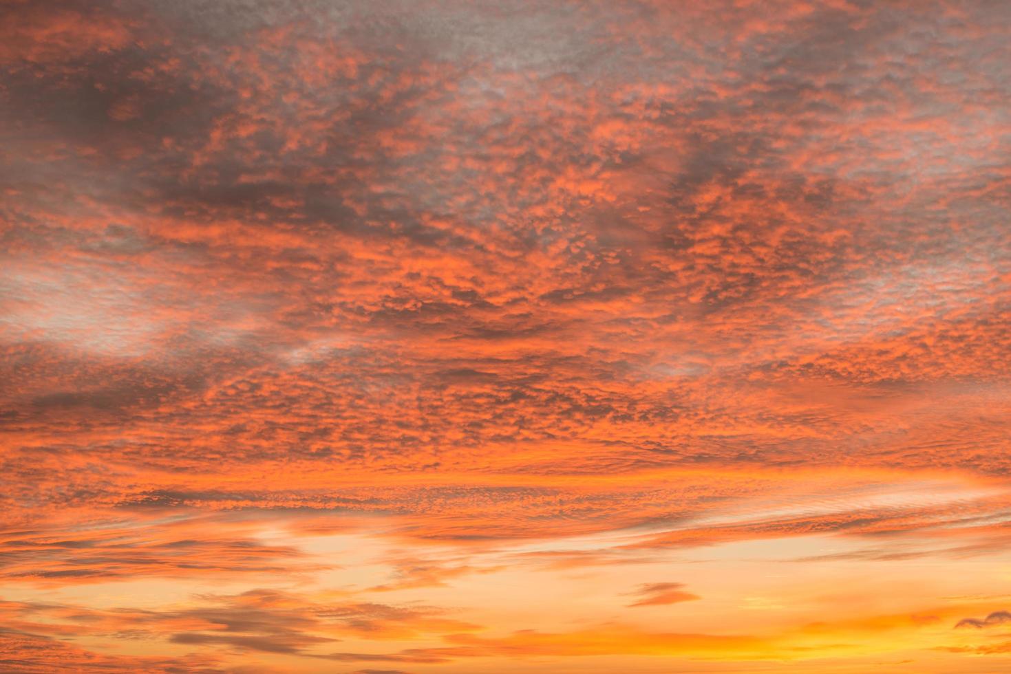 Dramatic beautiful sky with spectacular clouds at sunrise or sunset. photo