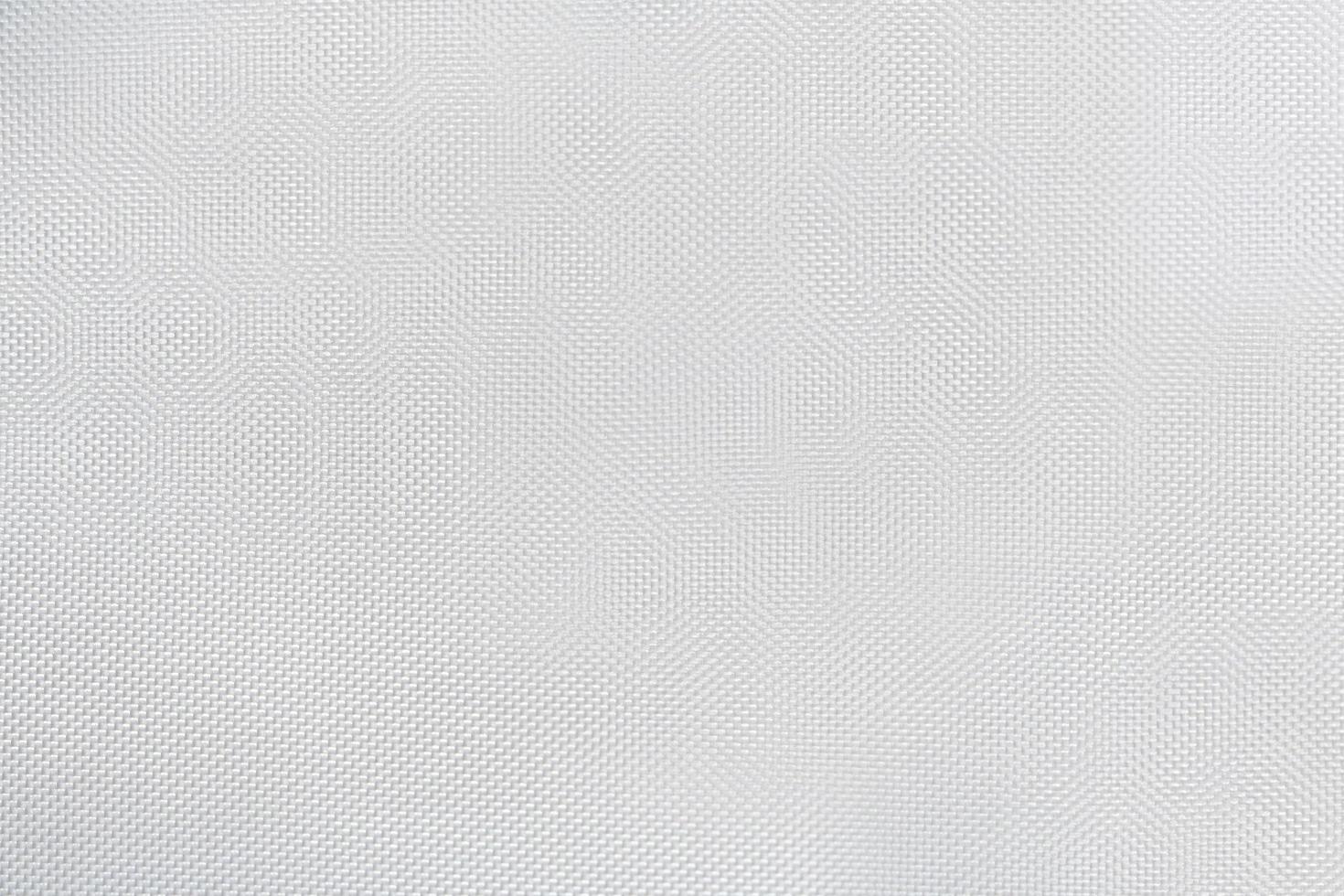 Texture of white canvas with material flake small pieces, abstract pattern background photo