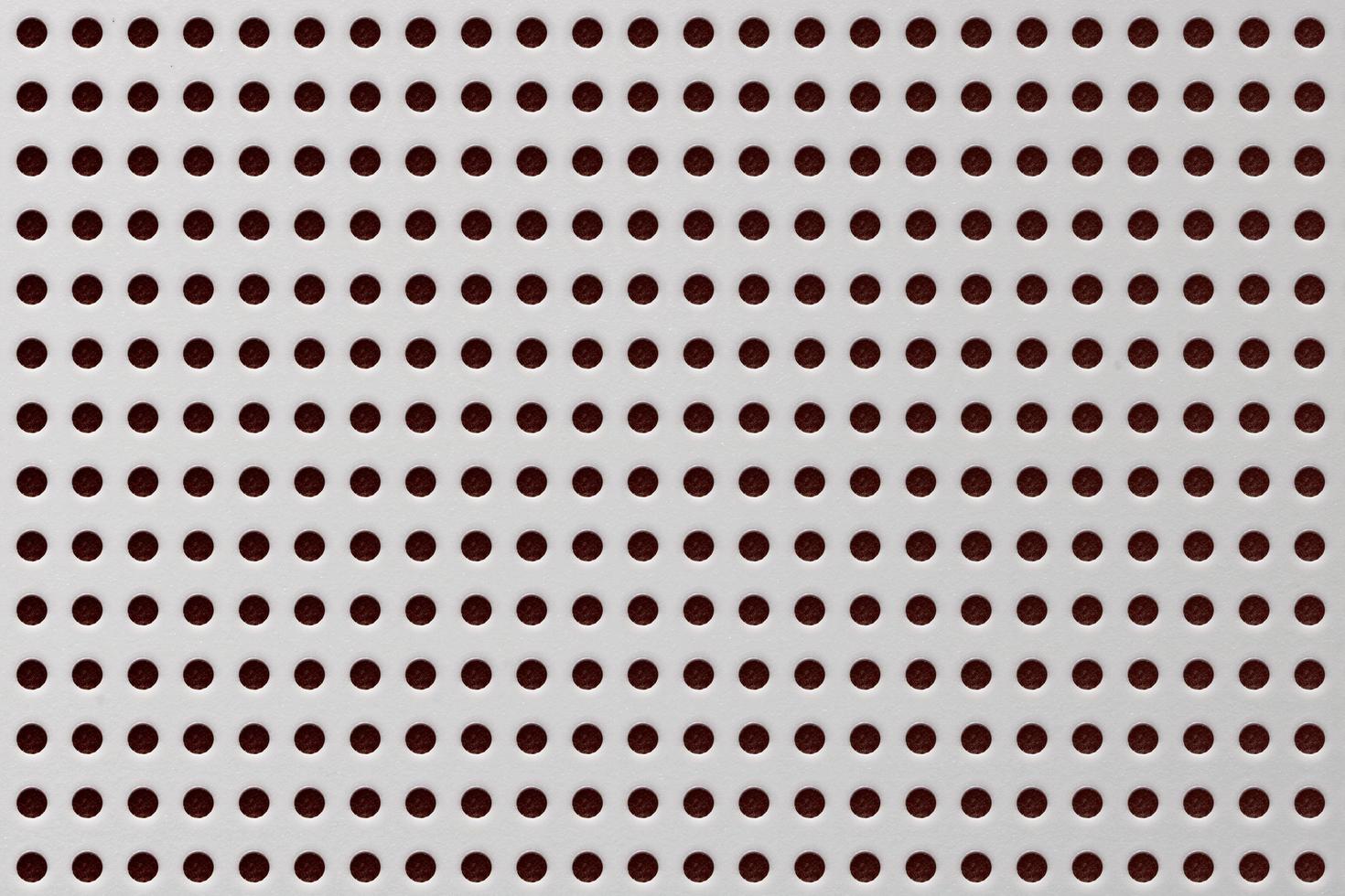 Texture of cutting hole white plastic or drilling holes on canvas