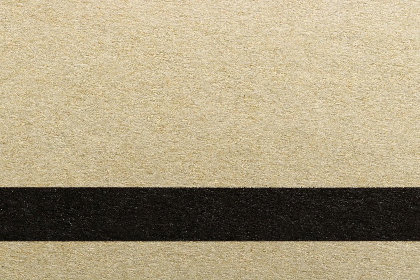 Texture of horizontal black line on brown cover paper, abstract pattern background photo