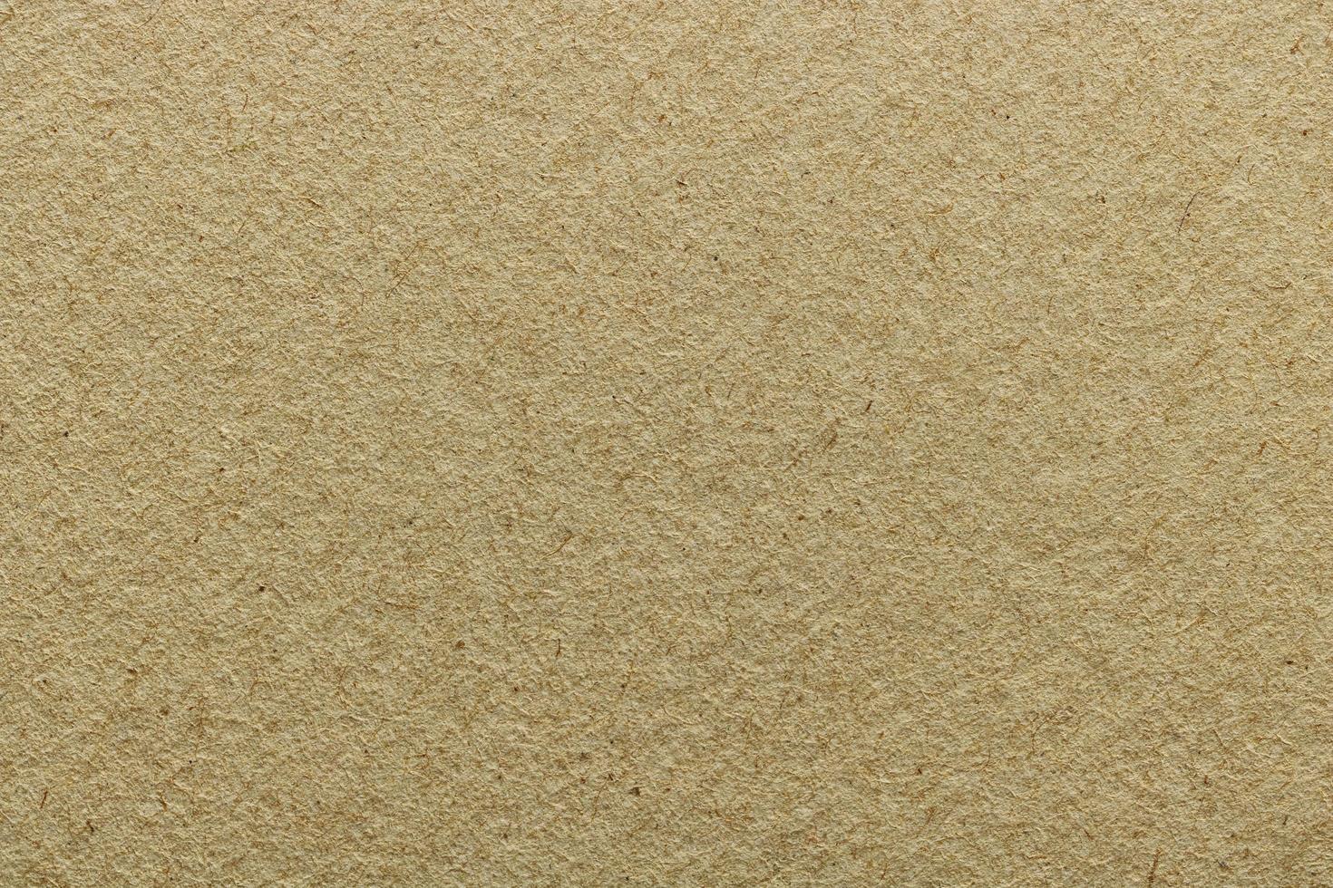 Texture of rough dark brown recycle paper, abstract pattern background photo