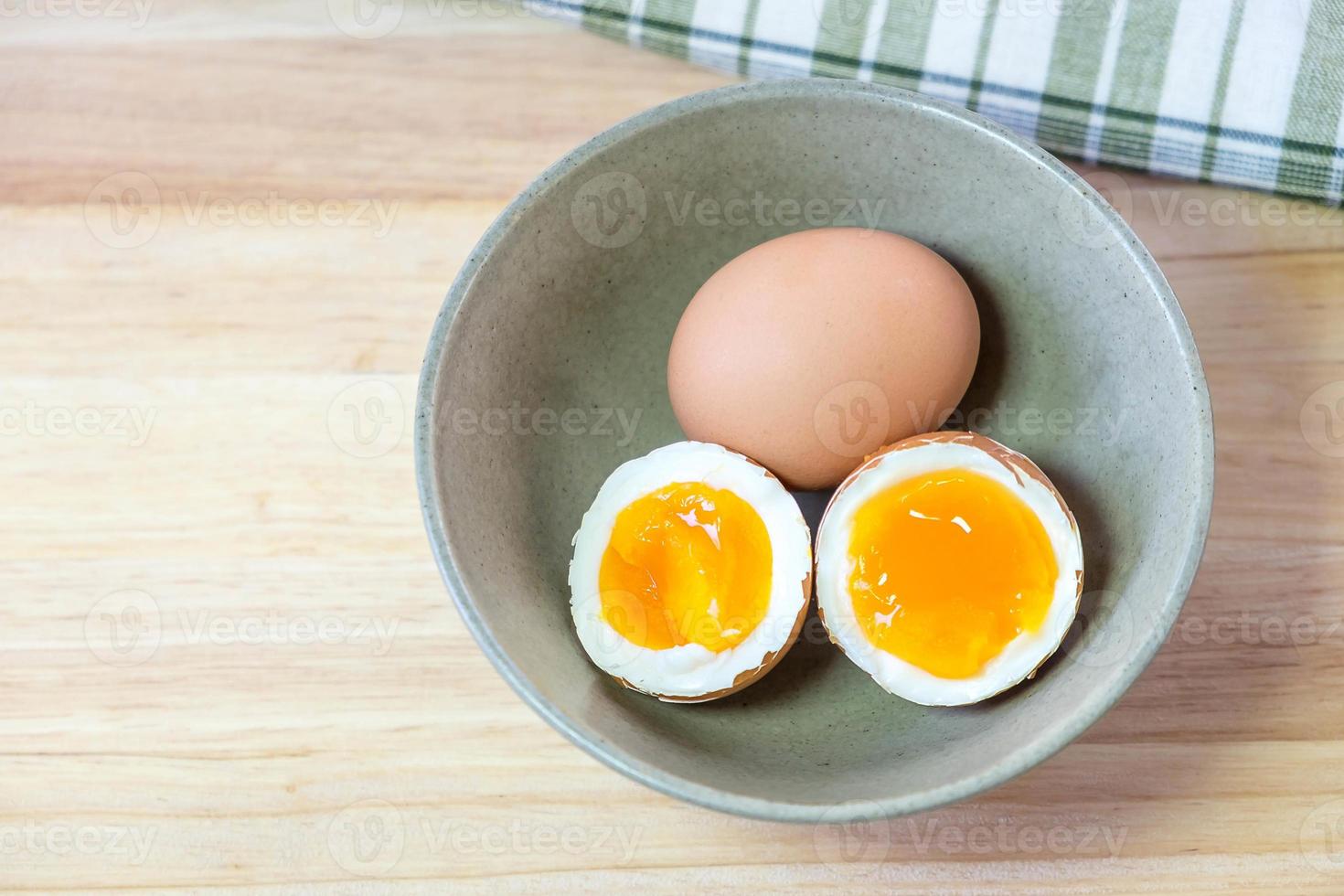 half medium-boiled eggs in Japanese Bowl photo