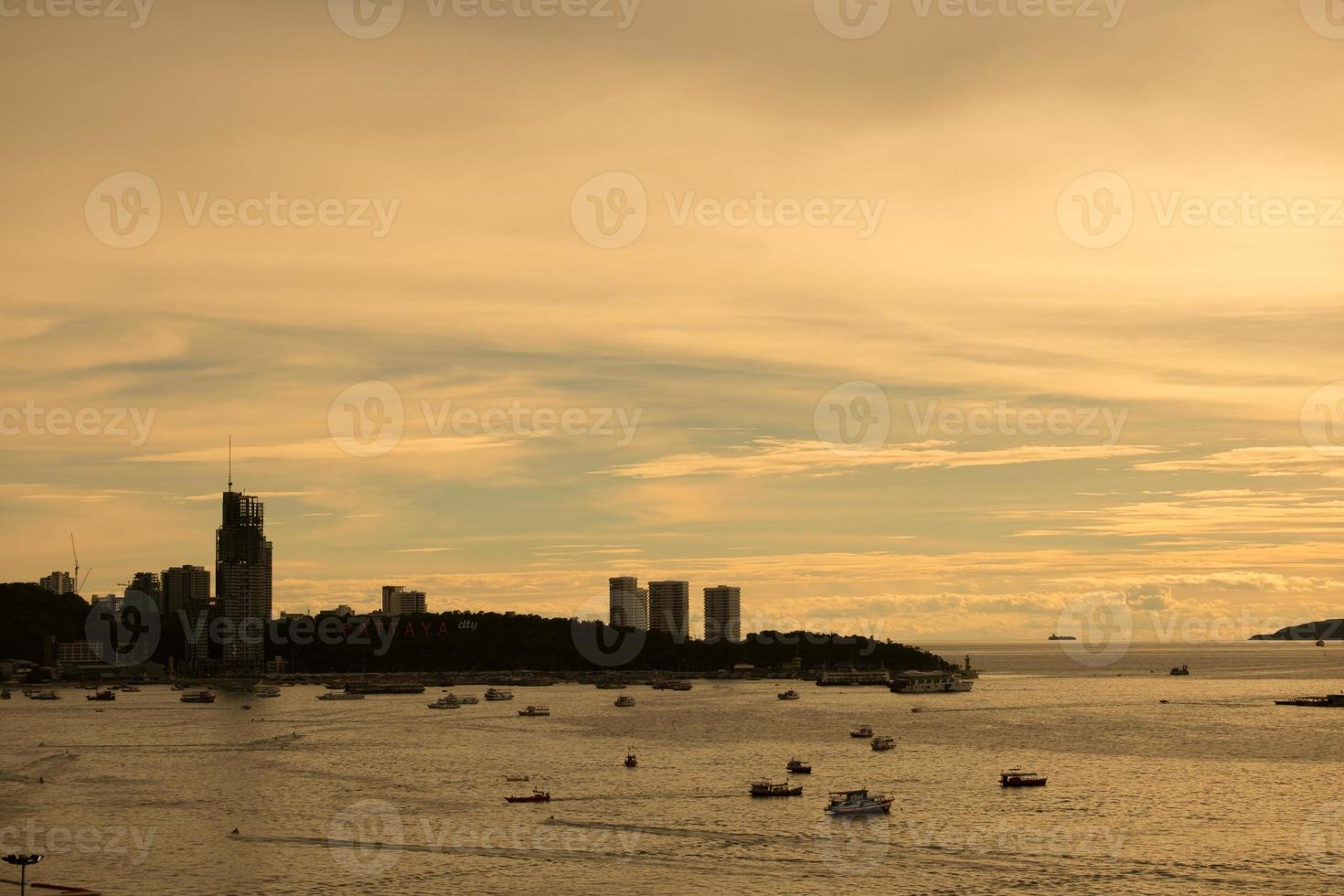Sea view of Pattaya Thailand in the sunset photo