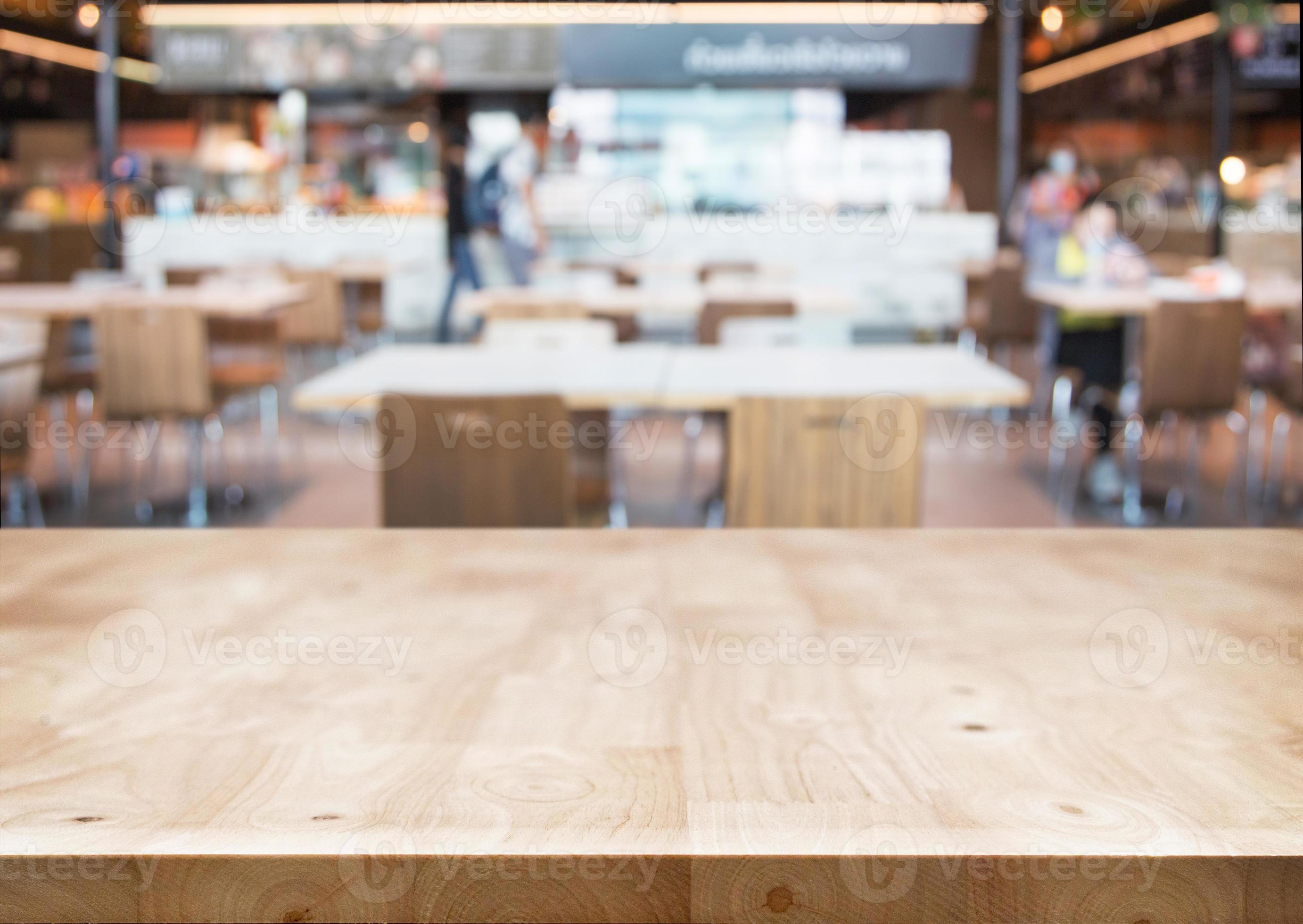 Empty wood table with blur restaurant background 6990847 Stock Photo at  Vecteezy