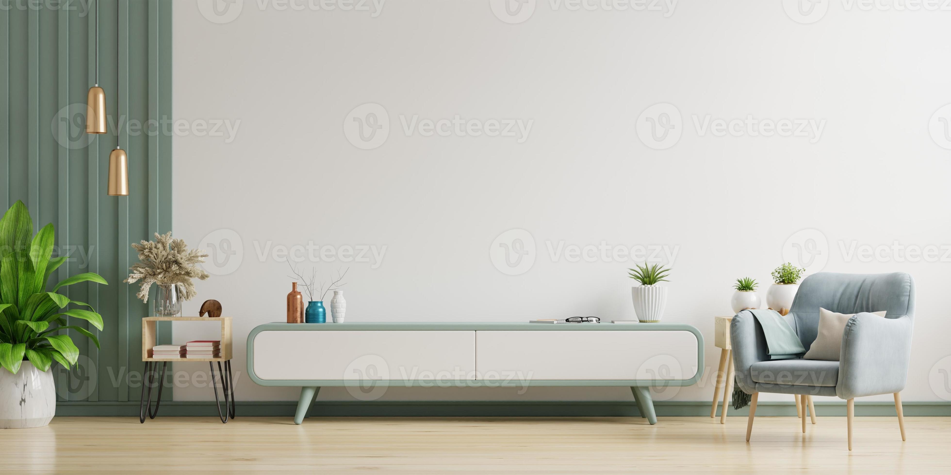Cabinet TV in modern living room,Interior of a bright living room with  armchair on empty white wall background. 6991274 Stock Photo at Vecteezy
