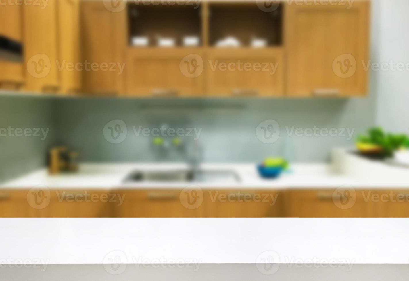 white wooden table with kitchen interior background photo