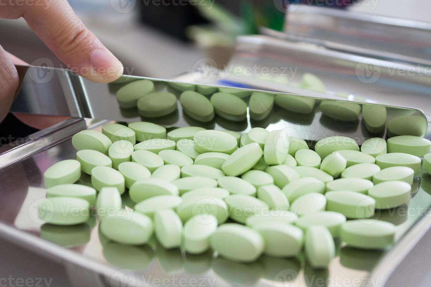 medicine pills on counting tray photo