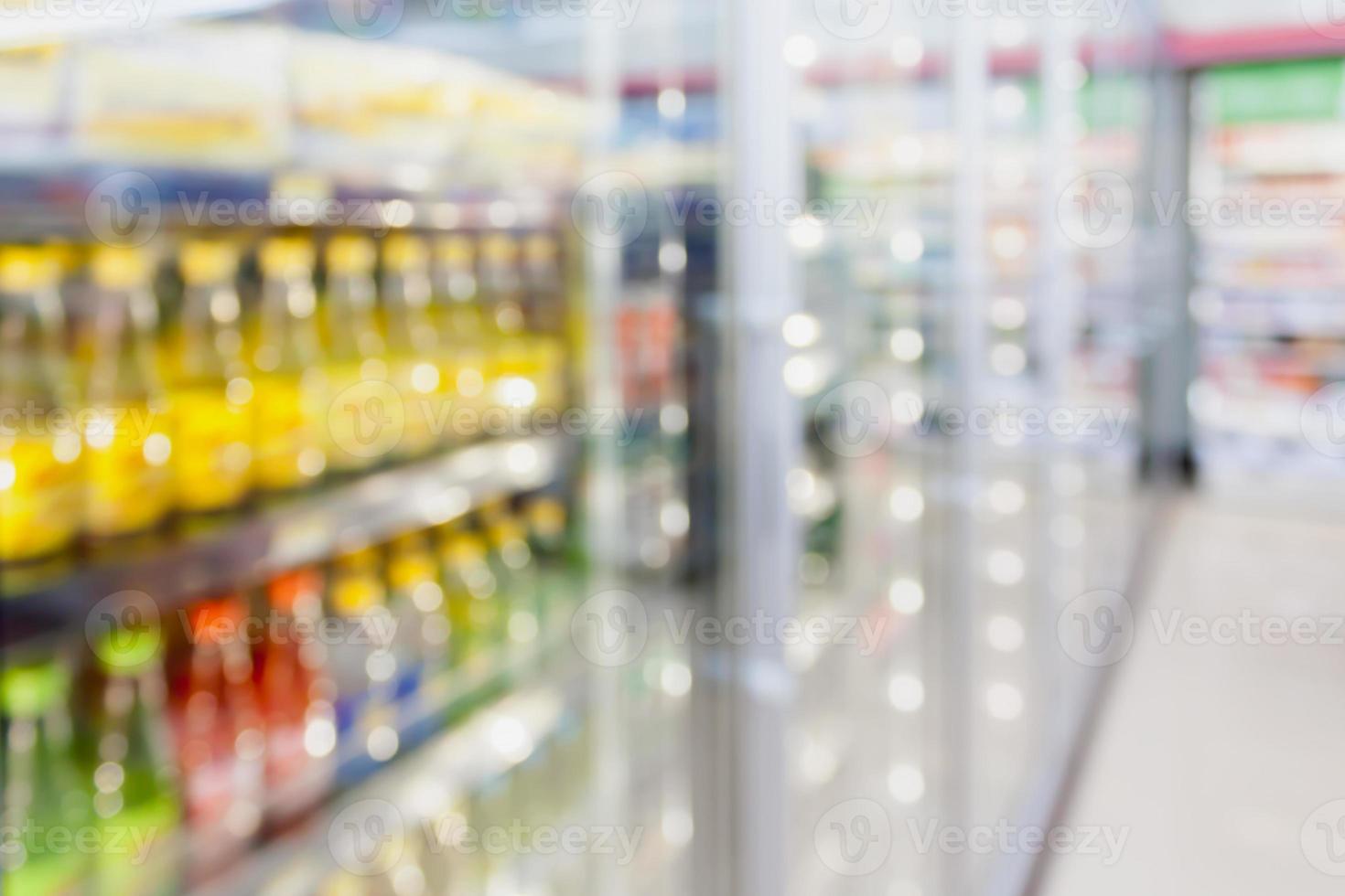 convenience store refrigerator shelves blurred background photo