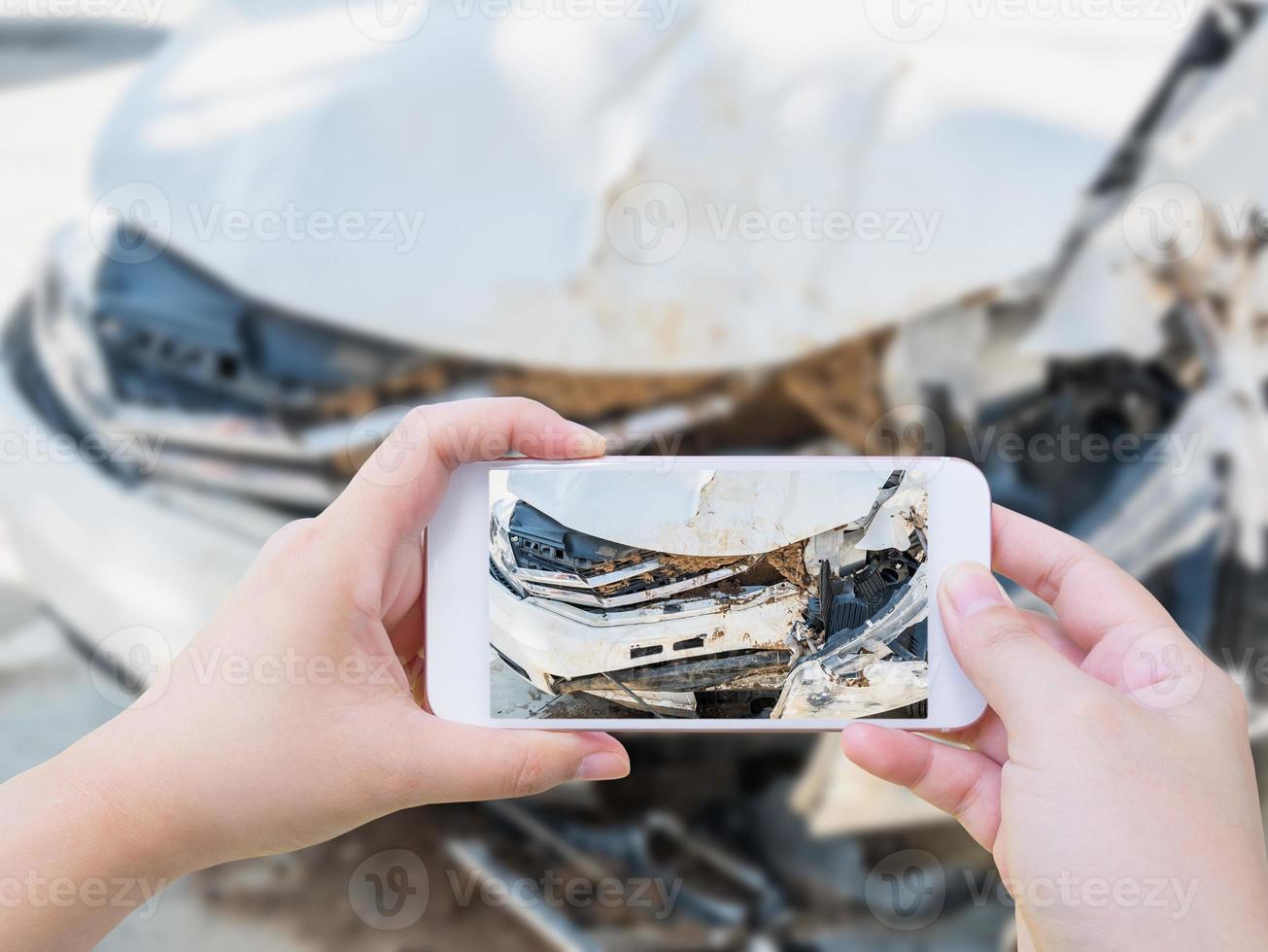 taking photo of the car crash accident damage