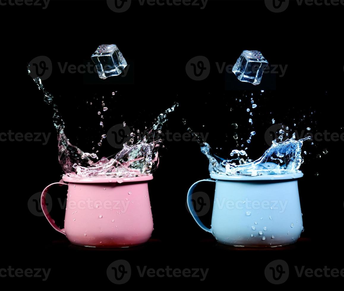 Colorful glass of water with splashing photo