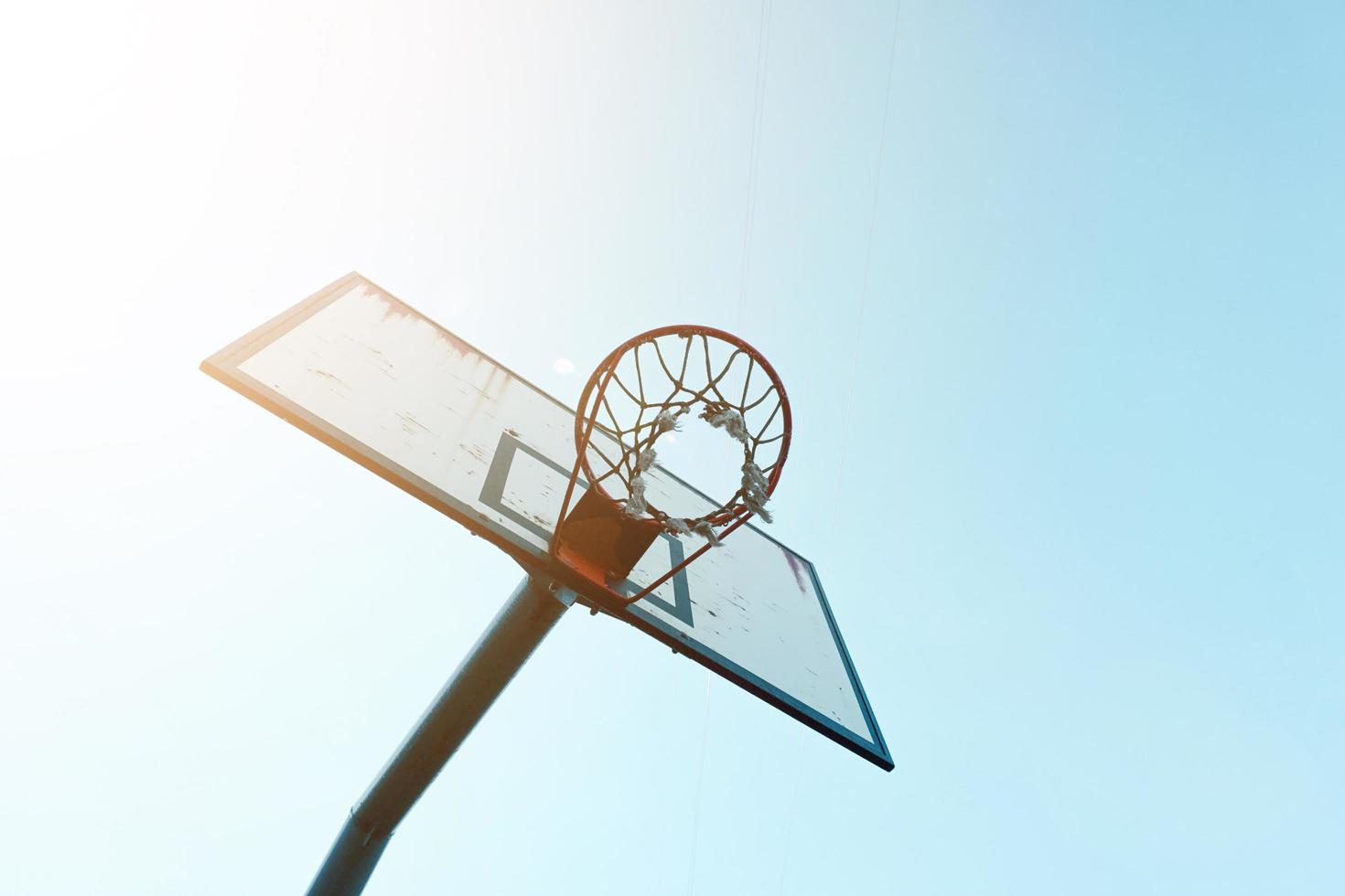 old street basket hoop, sports equipment photo