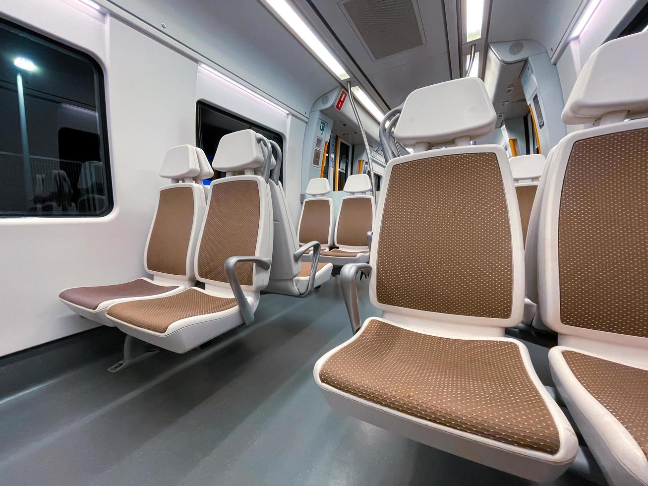 empty seats in the train car, mode of transportation photo