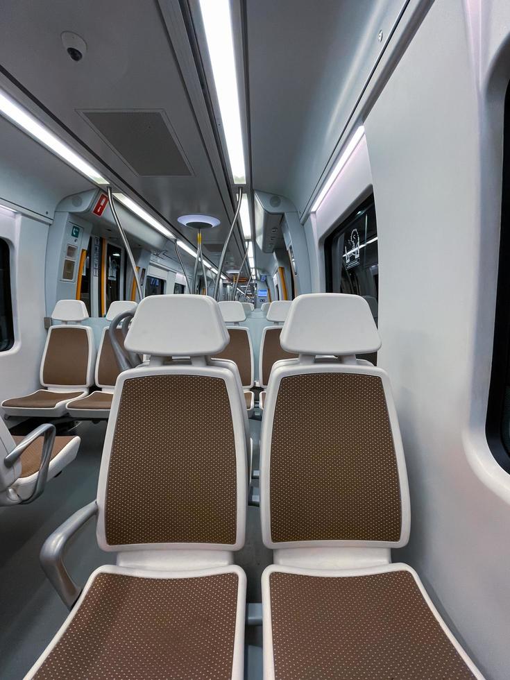 empty seats in the train car, mode of transportation photo