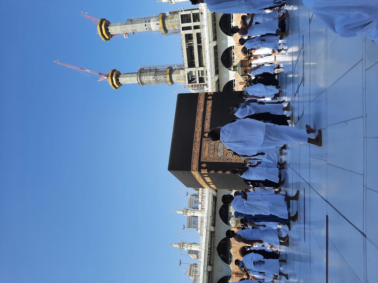 Makkah, Saudi Arabia, 2021 -  Visitors from all over the world are performing Tawaf in the Masjid al-Haram in Makkah. photo