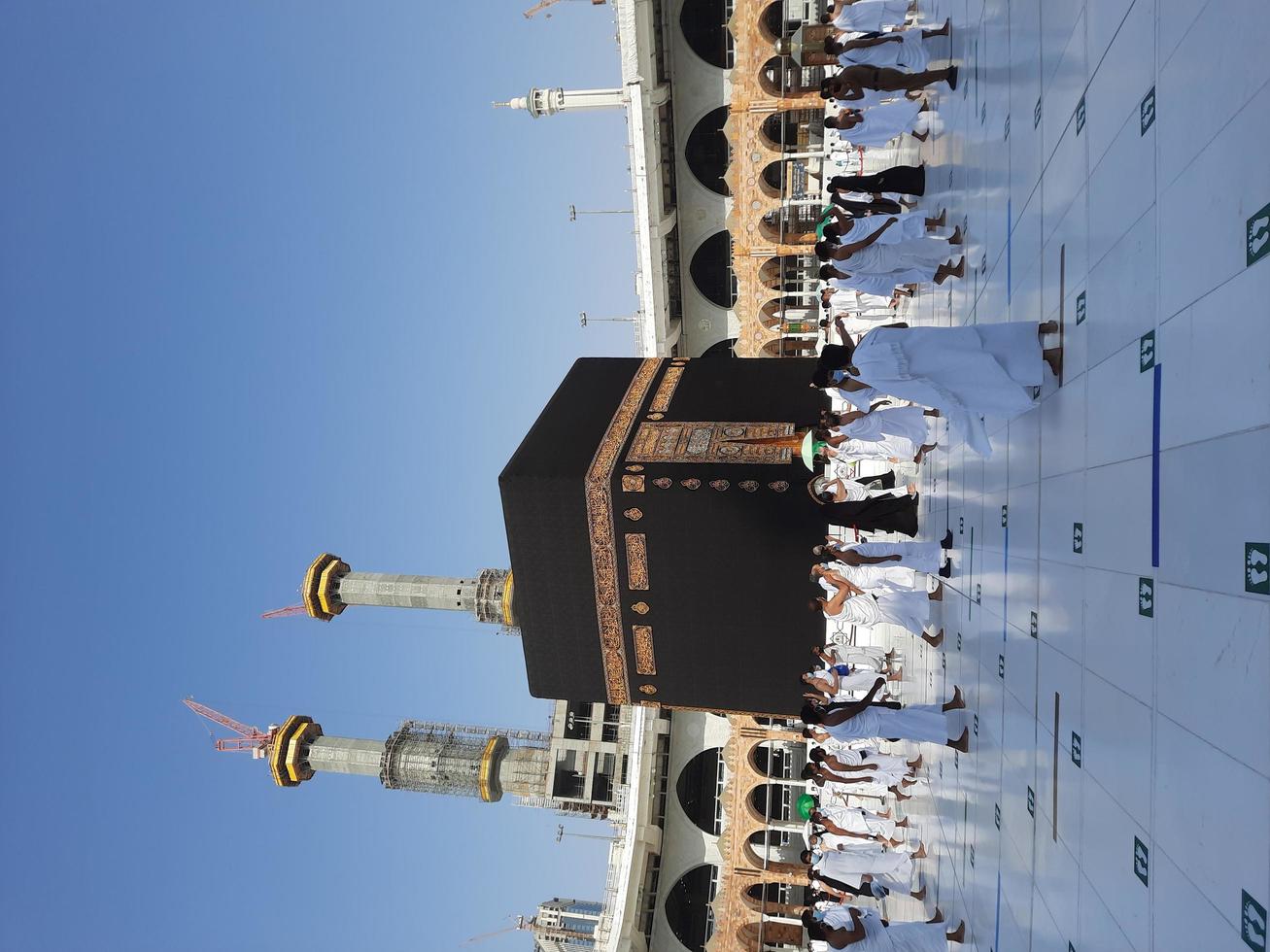 Makkah, Saudi Arabia, 2021 -  Visitors from all over the world are performing Tawaf in the Masjid al-Haram in Makkah. photo