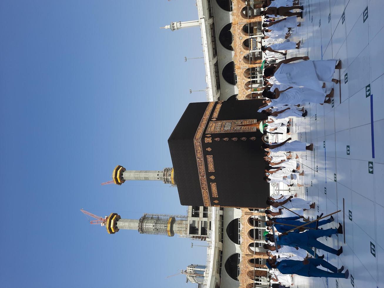 Makkah, Saudi Arabia, 2021 -  Visitors from all over the world are performing Tawaf in the Masjid al-Haram in Makkah. photo