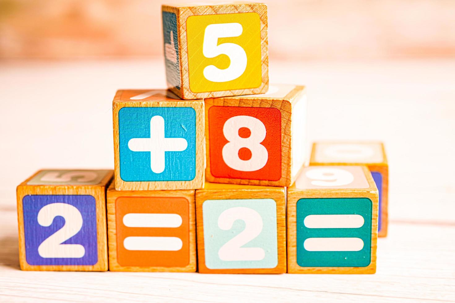 Number wood block cubes for learning Mathematic, education math concept. photo