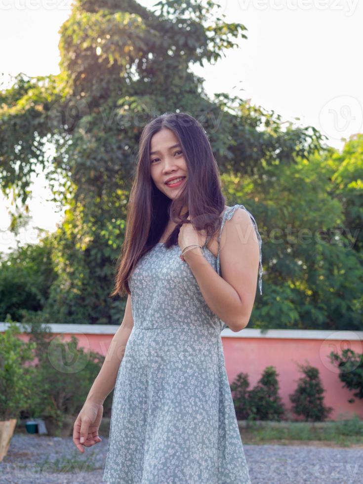 Woman wearing sky blue dress photo