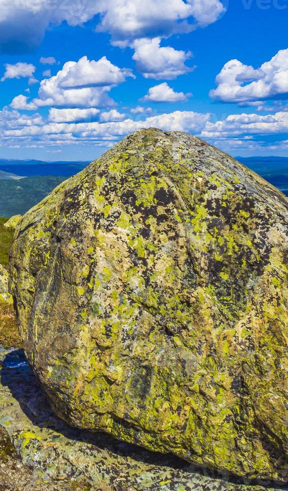 Huge rock big boulder snowed in Mountains panorama Norway Hemsedal. photo