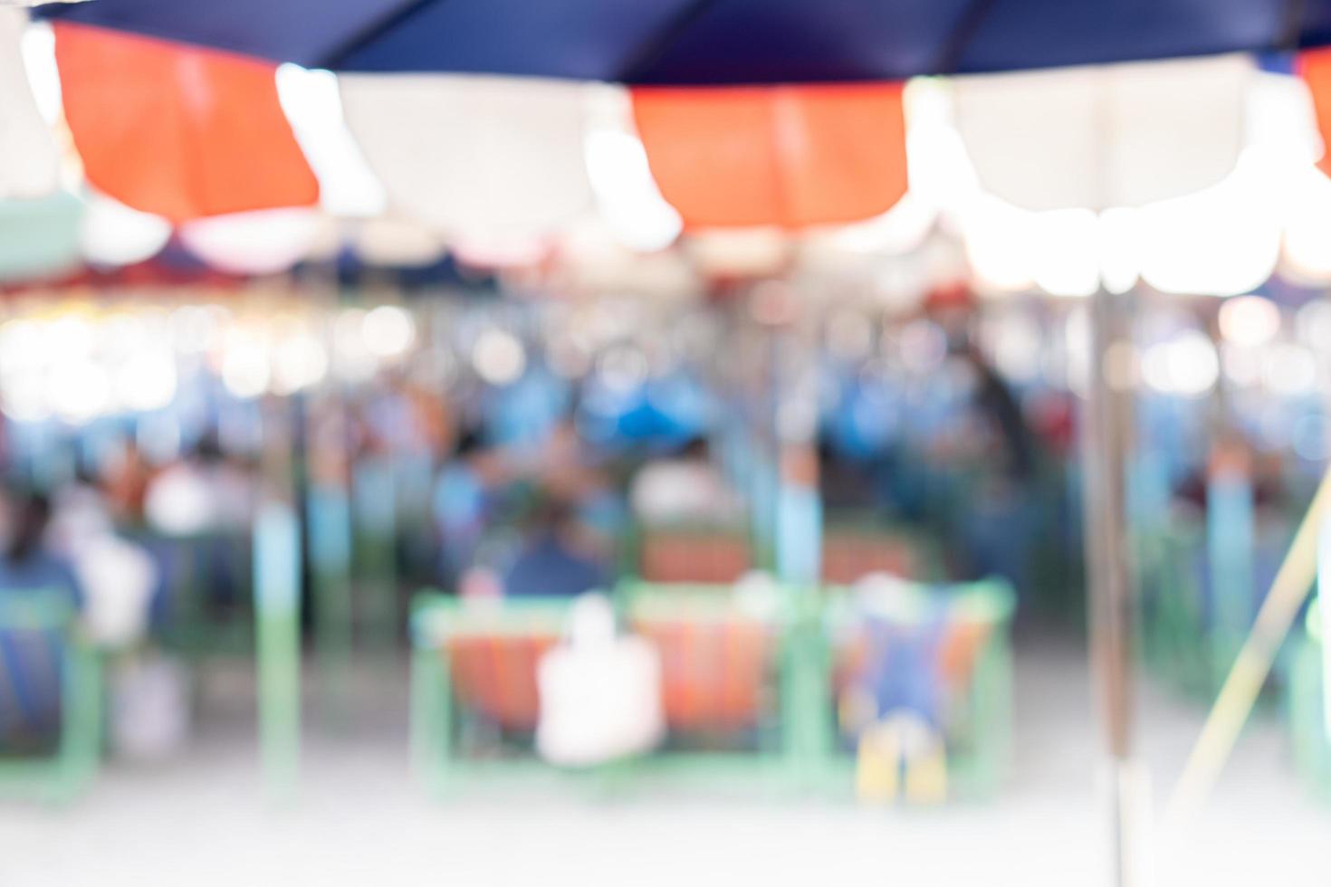 Blurred background, Umbrella area to sit and relax and eat on the beach, Seascape, Bangsaen beach Chonburi Thailand photo