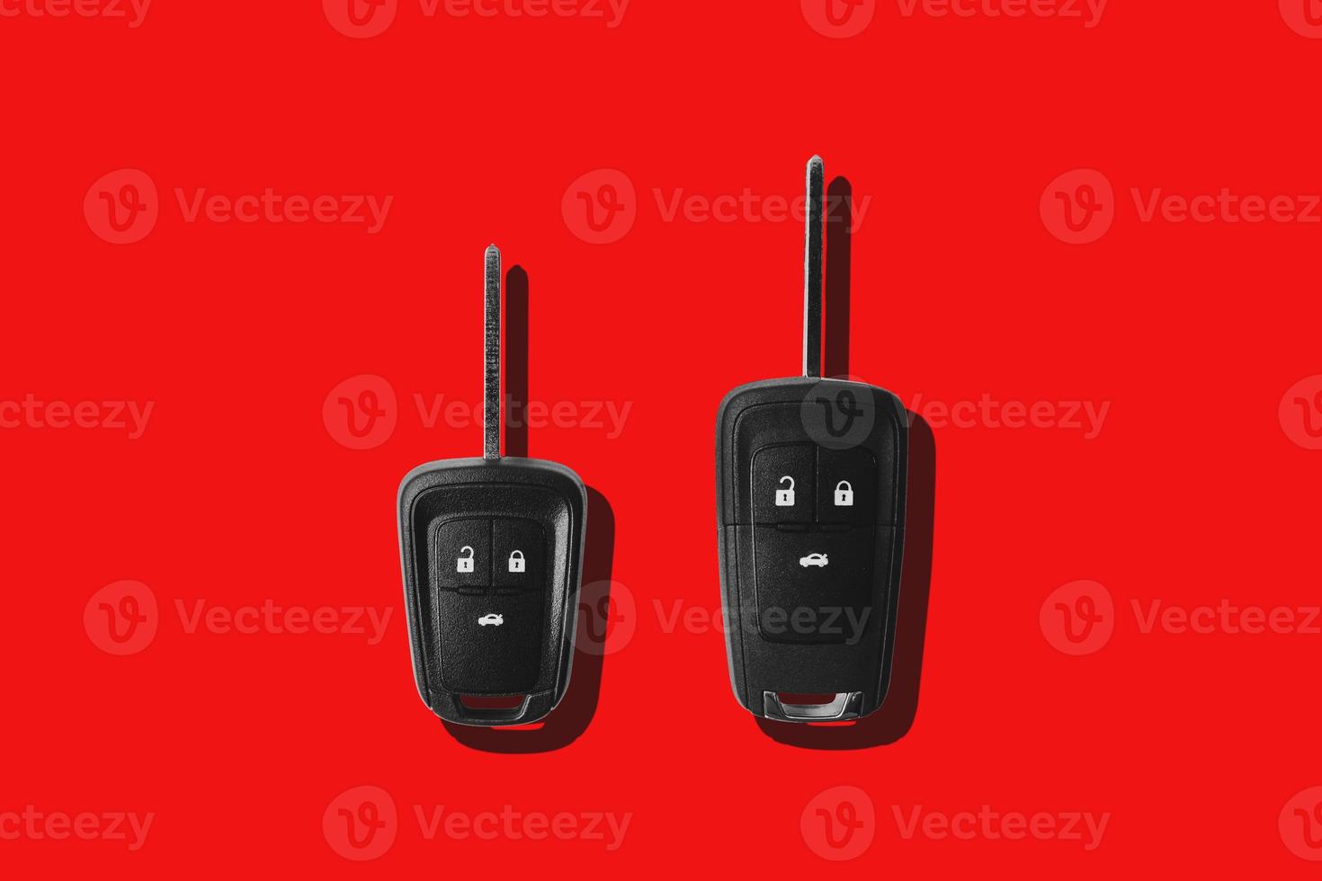 New keys car on red background. photo