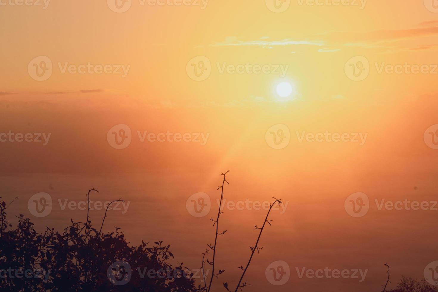 colorful sky with sun in clouds of altitude photo