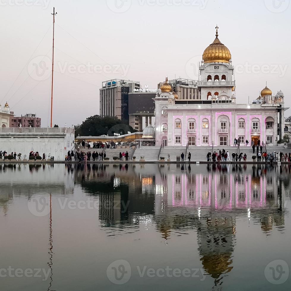 Gurdwara Bangla Sahib is the most prominent Sikh Gurudwara, Bangla Sahib Gurudwara inside view during evening time in New Delhi, India, Sikh Community one of the famous gurudwara Bangla Sahib view photo